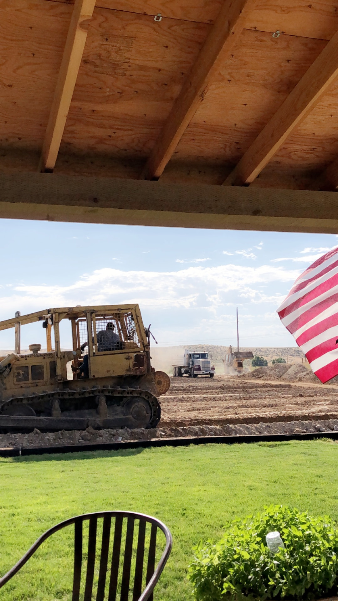 Dozer and haul truck moving dirt during site work